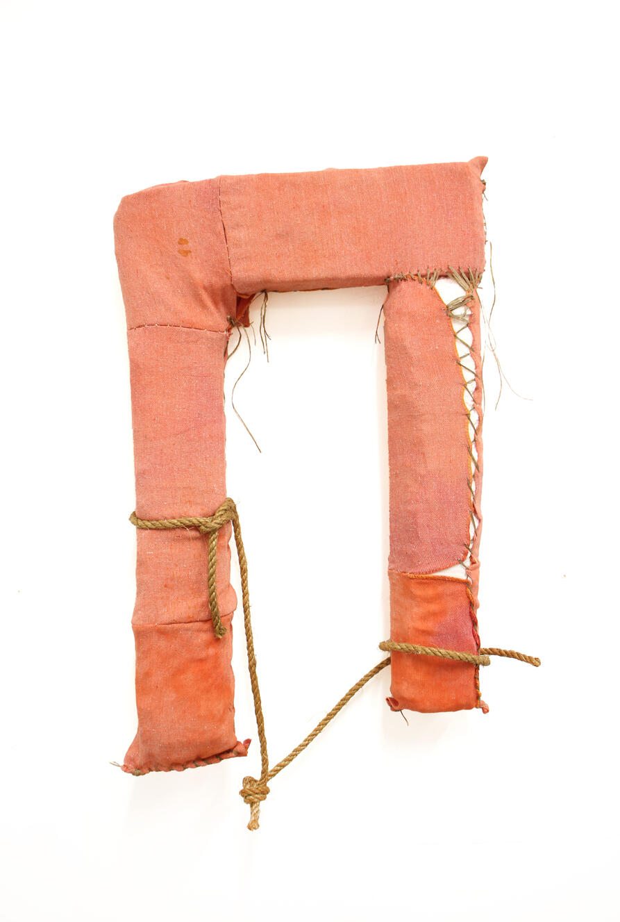 "Life Jacket 1", 2023, shop rag, sinew, styrofoam, rope, 16" × 24".